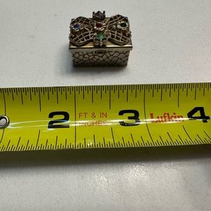 Miniature box with color stones on top